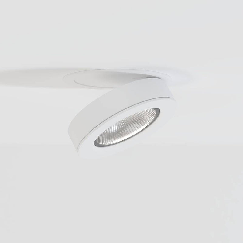 White curved downlight fixture with reflective lens mounted on ceiling.