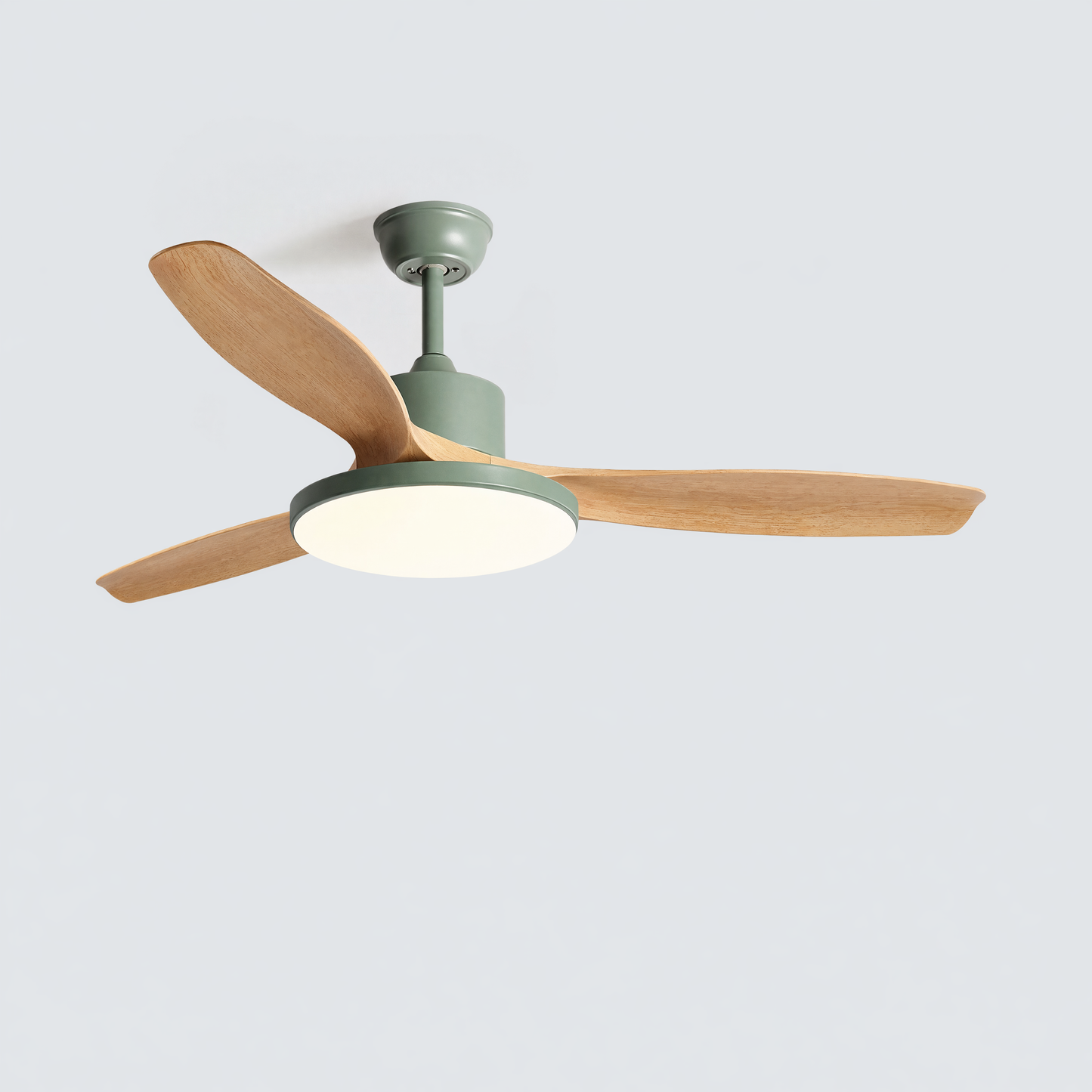 Ceiling fan with wooden blades and a green frame on a light gray background