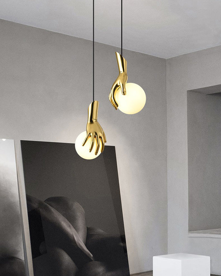 Olverai Hand Holding Globe Brass Pendant Light