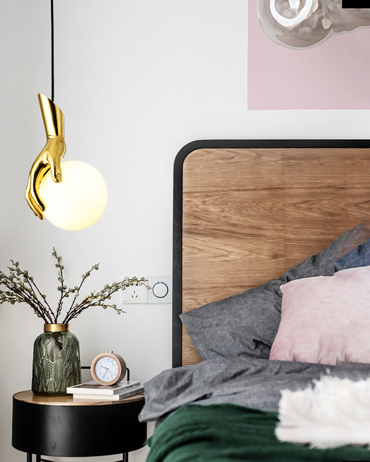 Olverai Hand Holding Globe Brass Pendant Light