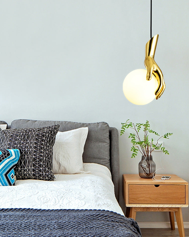 Olverai Hand Holding Globe Brass Pendant Light