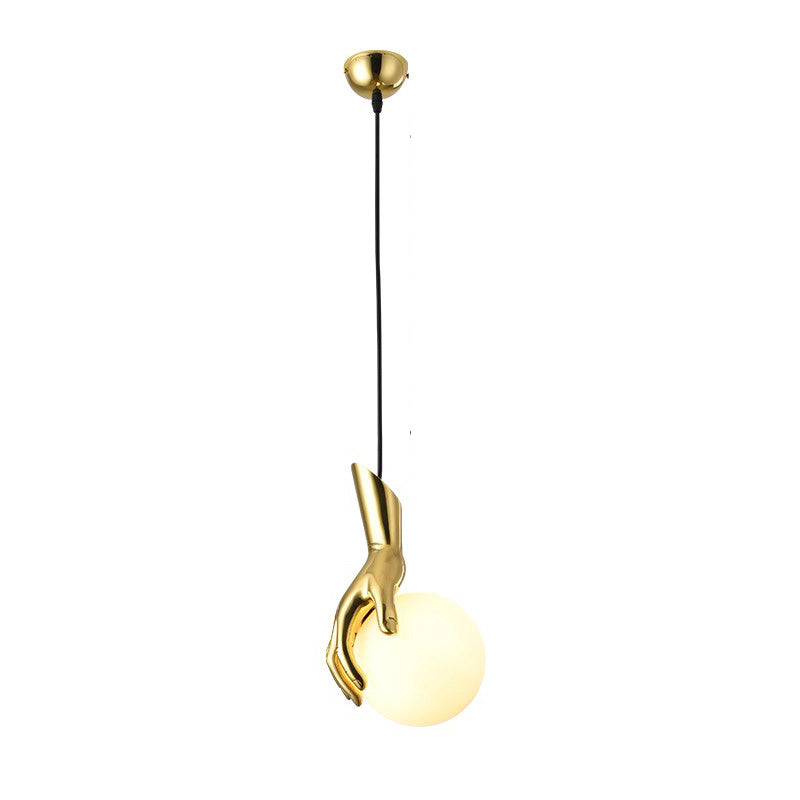Olverai Hand Holding Globe Brass Pendant Light