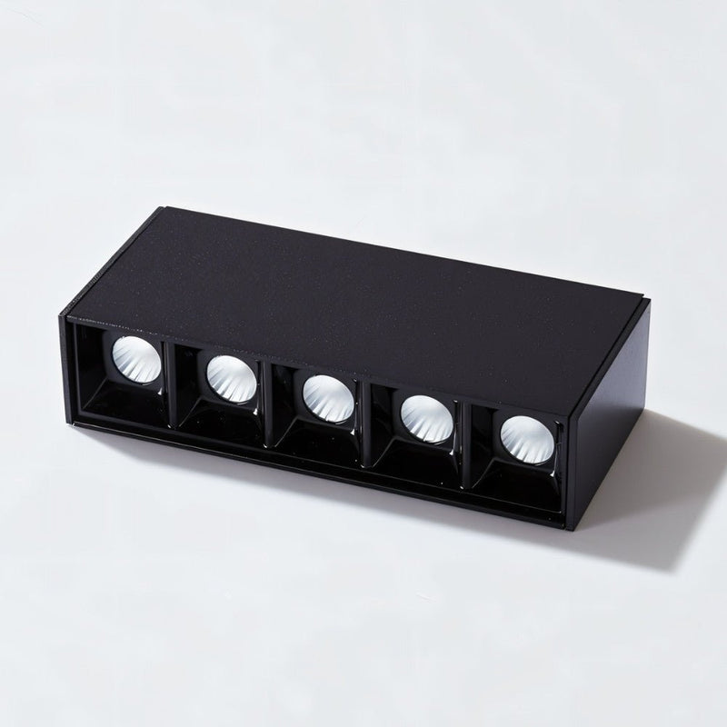 Black rectangular downlight fixture with five recessed LED spotlights on white background.