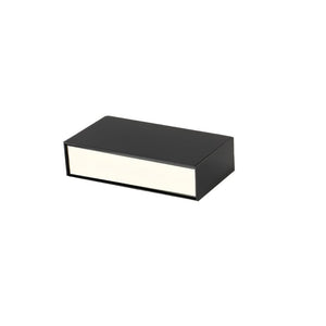 Black rectangular downlight fixture with cream-colored diffuser panel on white background.