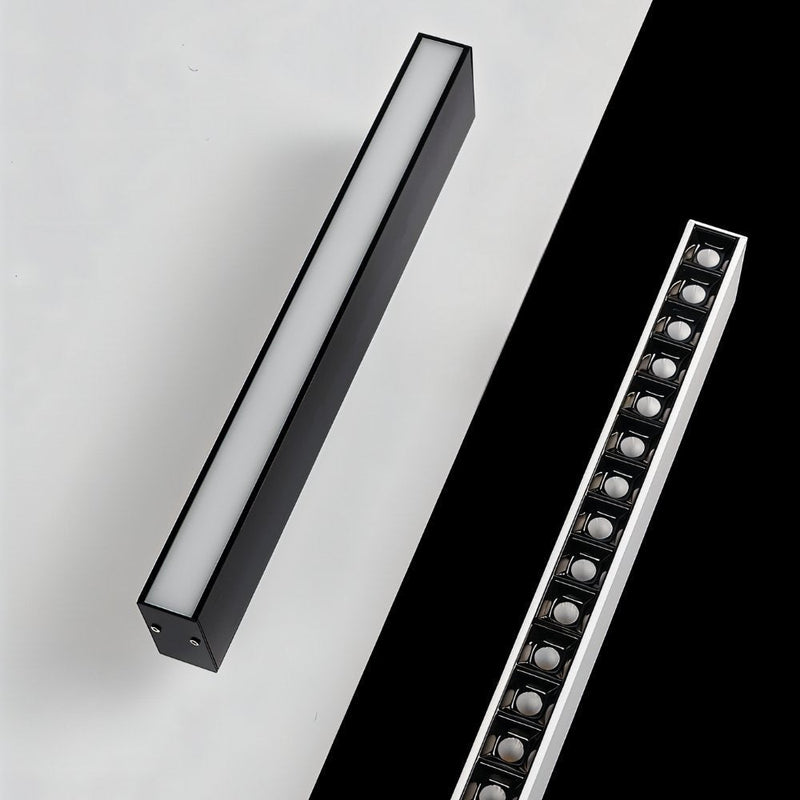 Sleek black linear downlight fixture displayed on white and black background surfaces.