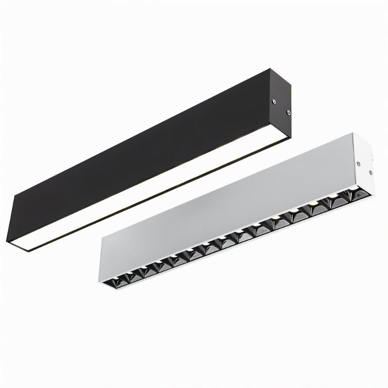 Two linear ceiling downlights in black and white finishes with integrated LED panels mounted horizontally.