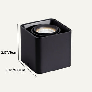 Black cubic downlight fixture with recessed LED bulb, shown against neutral background.