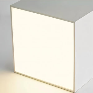 White square recessed ceiling light fixture with integrated frame on neutral background.