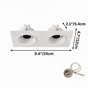 White recessed downlight fixture with two trim rings shown from front and below with mounting hardware.