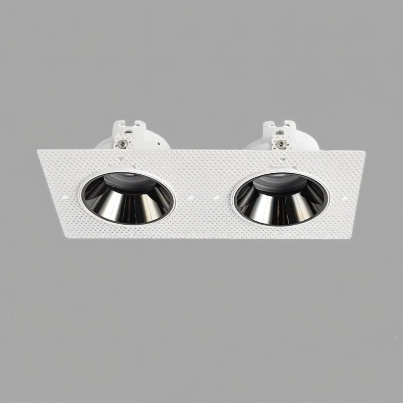 White rectangular recessed downlight with two black metal reflector cups on gray background.