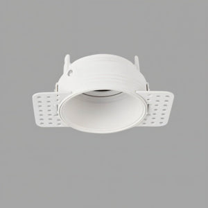 White recessed downlight with adjustable trim and mounting brackets on gray background.