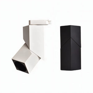 White and black adjustable track light fixtures shown on white background.