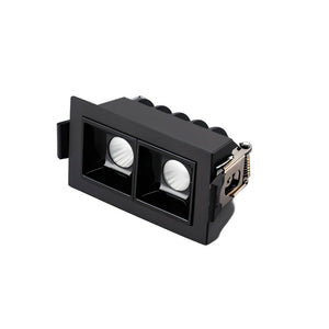 Black rectangular recessed downlight with dual white circular lenses and metal connector on white background.