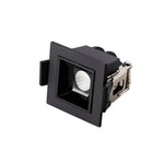 Black square recessed downlight fixture with white lens on white background.