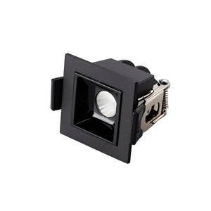 Black square recessed downlight fixture with white lens on white background.