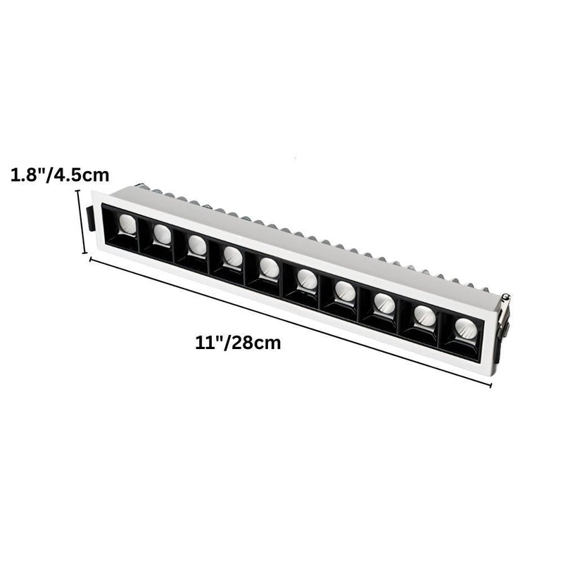 Linear recessed downlight fixture with white trim and black baffle housing, measuring 11"x1.8".