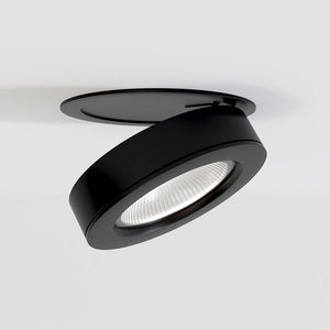 Black recessed downlight with adjustable trim and frosted lens mounted in white ceiling.