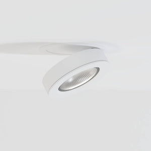 White curved downlight fixture with reflective lens mounted on ceiling.